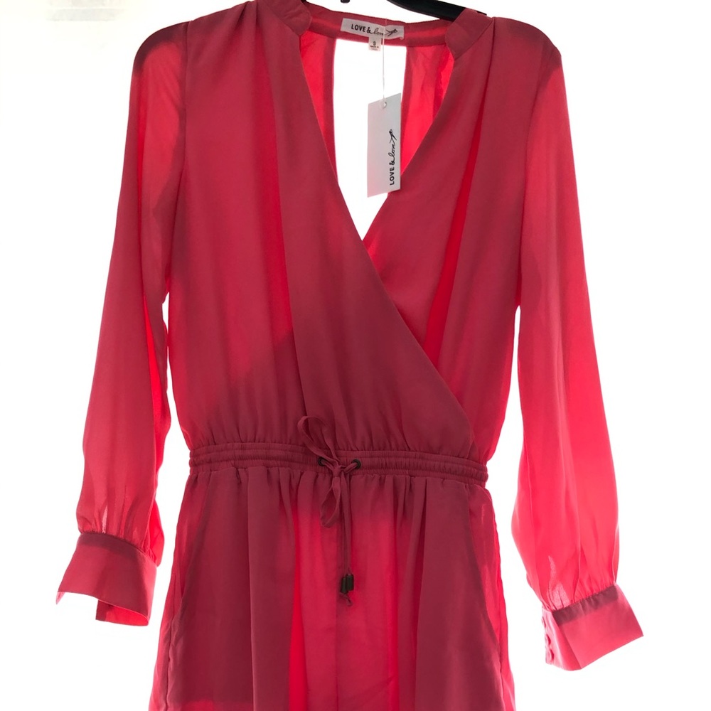 Adorable long sleeve / shorts romper ! Never worn